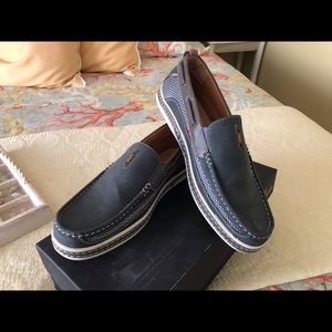 Blue loafers boat shoes